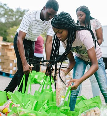 Youth in Houston, Texas fill bags with needed supplies after Hurricane Harvey