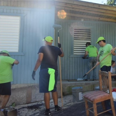 A team gathers to repair a building structure