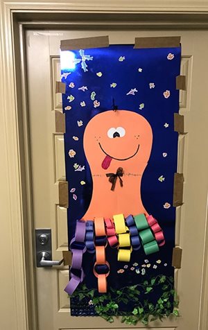 Some doors in the decorating contest can be fun, like this one, showing a space monster.