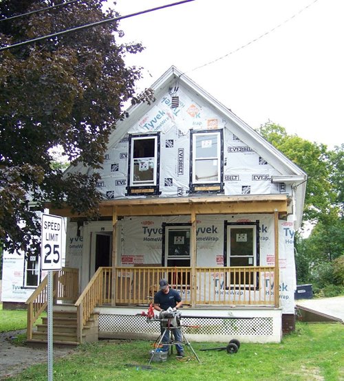 A house in the recovery program, being refurbished. The photo shows construction