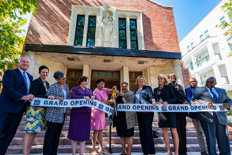 Ribbon cutting of the grand opening of new affordable homes in New Orleans