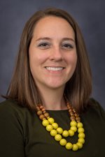 Headshot of Molly Barackman Eder smiling at the camera.