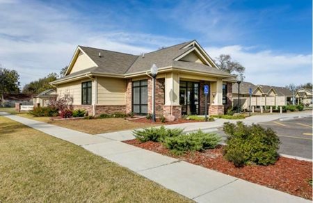 The sun shines brightly over a rental community at Mennonite Housing.