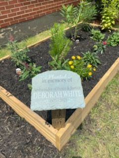 A garden honors Deborah White.