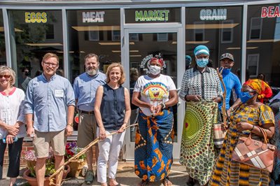 Opening the doors at a farmer's market in New Hampshire.