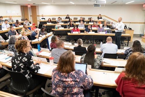 A full classroom at Harvard, before COVID-19.