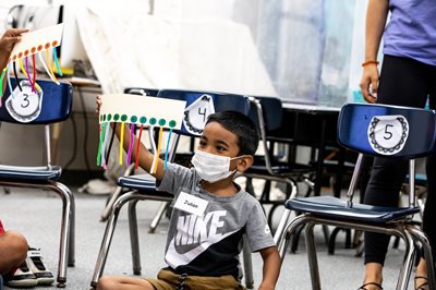 A student shows off how he learns his numbers.