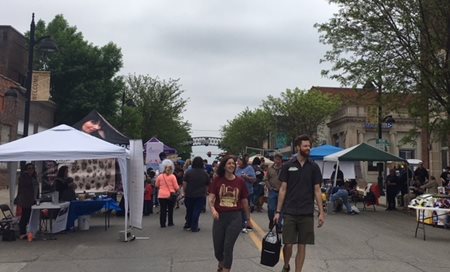 A celebration in Des Moines shows people on the streets.