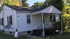 A white house symbolizes what the Housing Stability Counseling Program allows people to save.