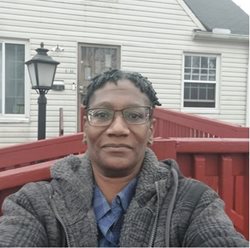 Catrina outside of her home in Cleveland.