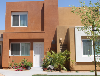 Newly-constructed adobo apartment buildings